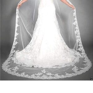 Chapel length lace edged ivory wedding veil - w/ comb